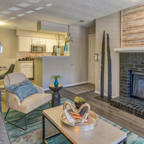 a living room with a fireplace