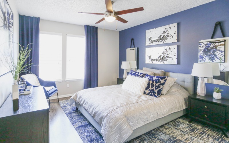 Bedroom with blue walls and decor