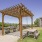 Pergola with grills and picnic table
