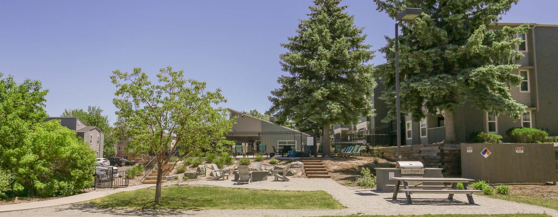 Outdoor amenity space surrounded by trees