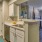 a kitchen with white cabinets